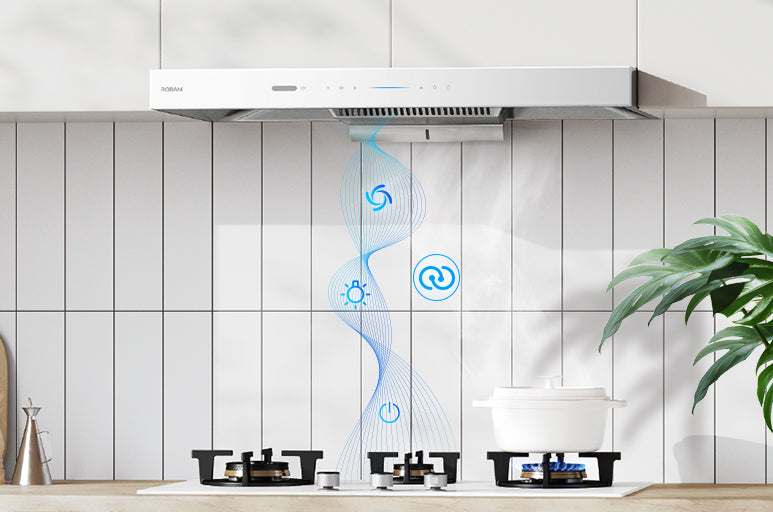 A white range hood mounted above a gas stove in a modern kitchen setting with a tiled backsplash, blue airflow graphics, and a potted plant on the right.