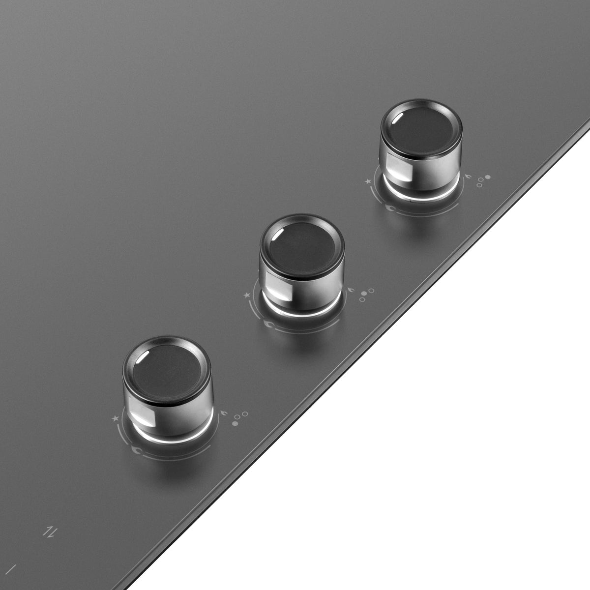Close-up of the three transparent control knobs on the ROBAM 9B7H31 grey glass gas cooktop