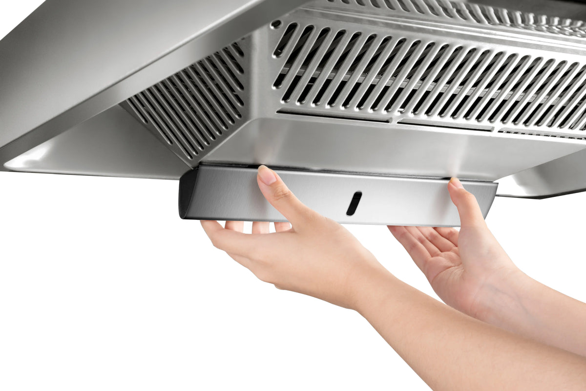 Hands removing the oil tray from ROBAM CleanAir 1.0 A8300 stainless steel rangehood