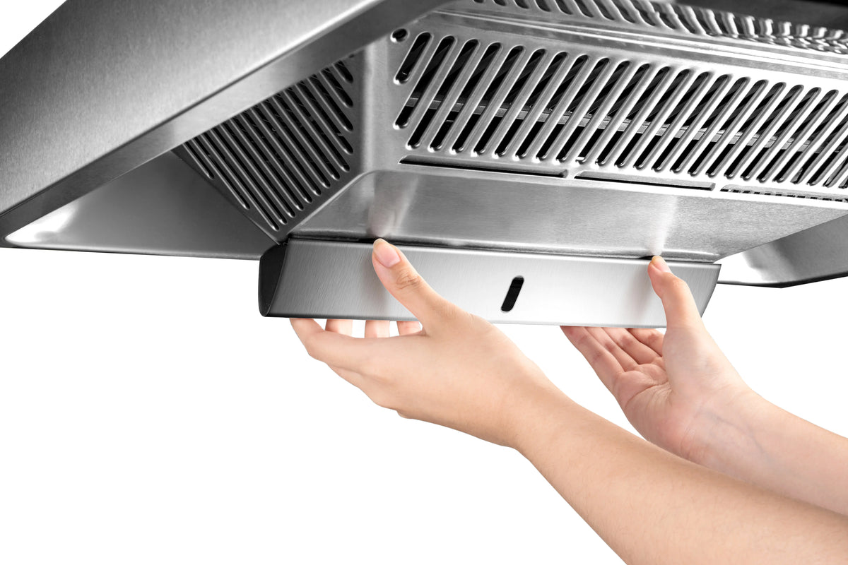 Hands removing the oil tray from ROBAM CleanAir 2.0 A8303 stainless steel rangehood